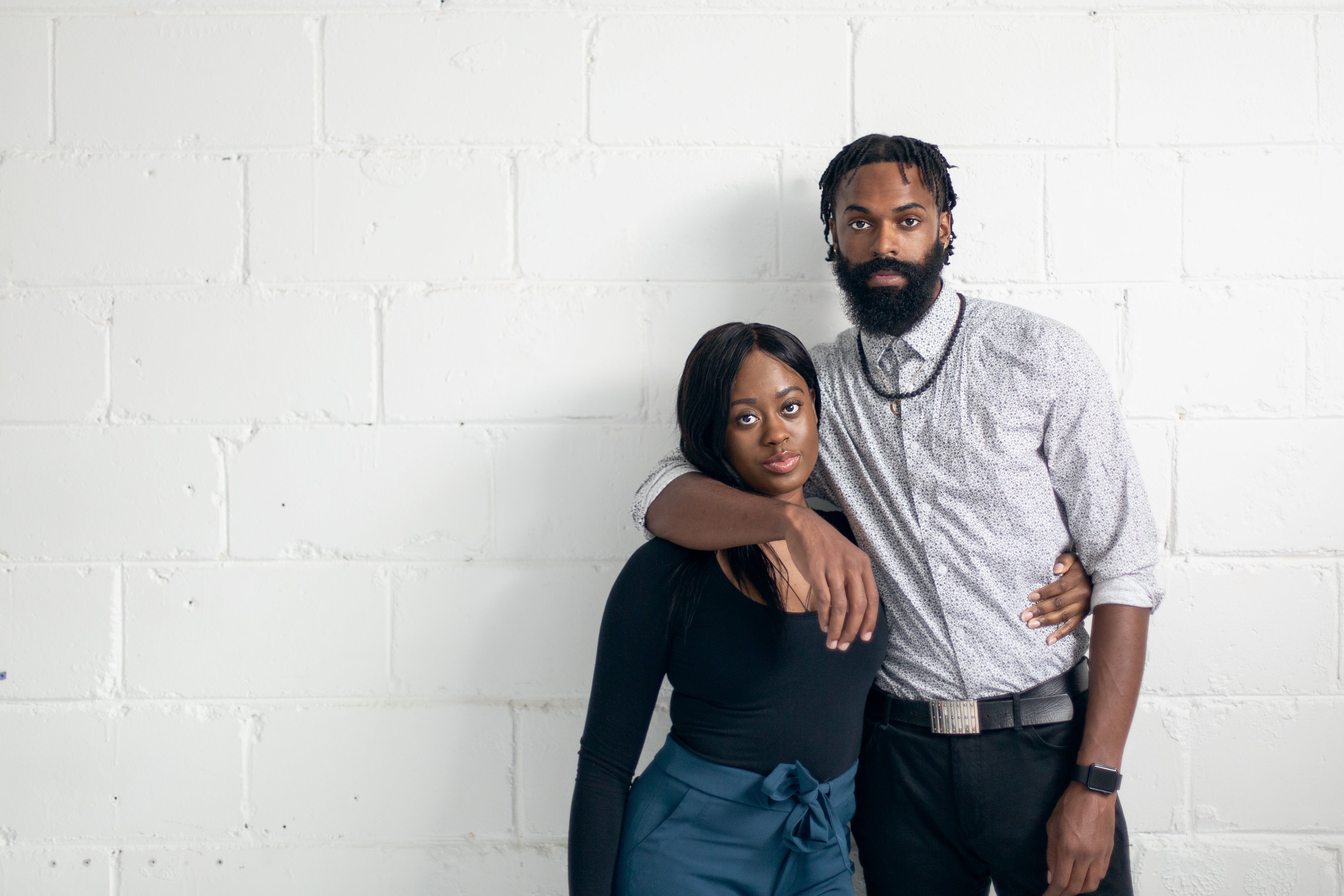 files/portrait-of-a-man-and-women-against-a-white-wall.jpg